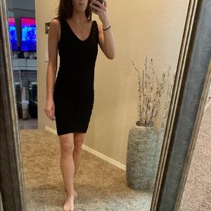 Express black fitted mini dress.
